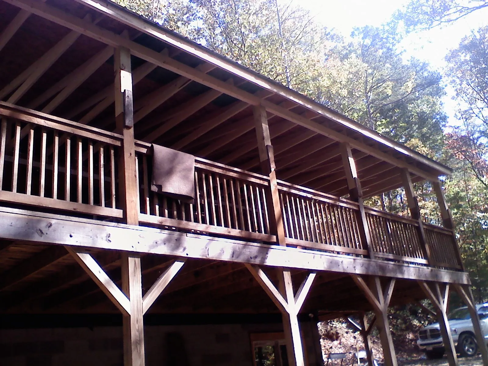 Timber framing under a new elevated porch and deck — Roof Leak Repair in Berkeley Springs by Roofing Brothers